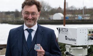 Photo caption : ‘Dr Richard Taylor, CEO and Founder of Vector Photonics, with the PCSEL and optical communications system at the successful demo across the Clyde.’